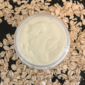 Oat milk cream formula in jar with oats
